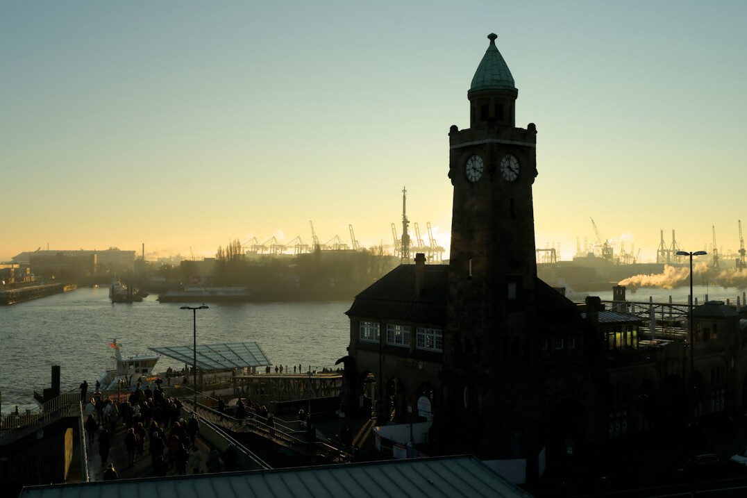 Foggy historic harbor warehouses in Hamburg at dawn