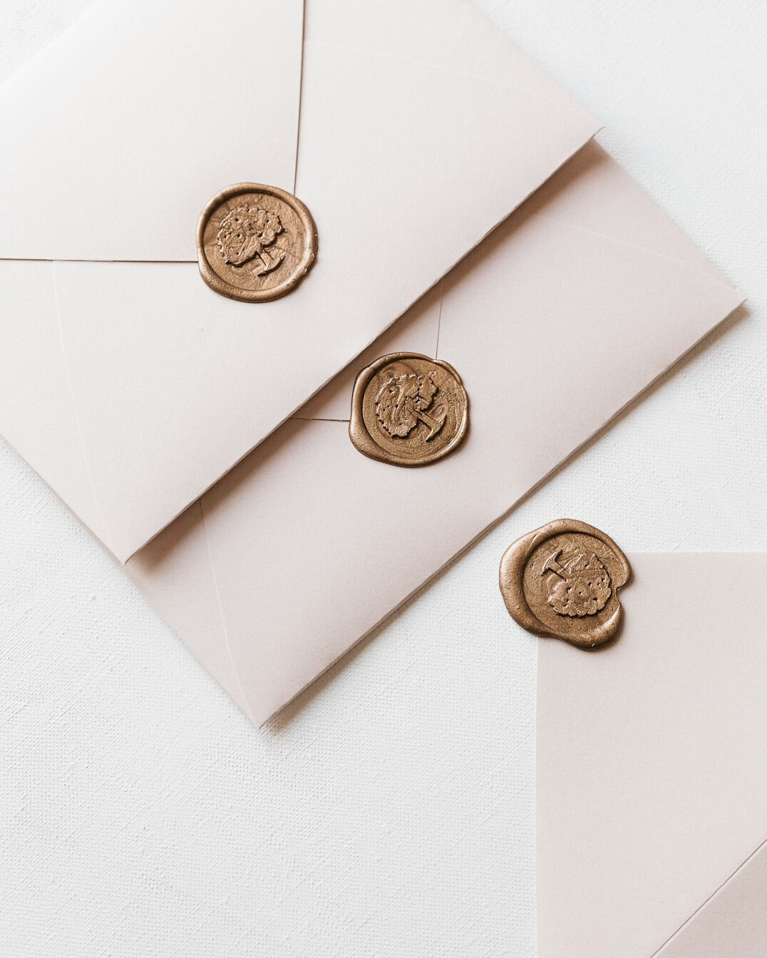 Sealed historic letter with wax seal and old envelopes on a desk