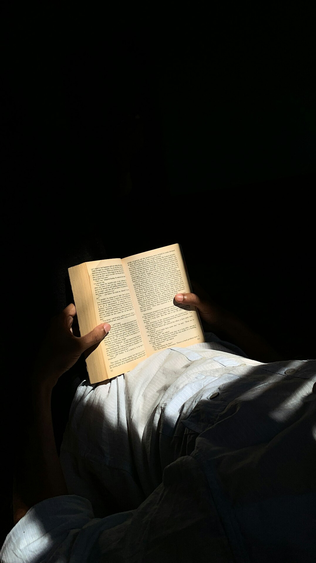person reading old book